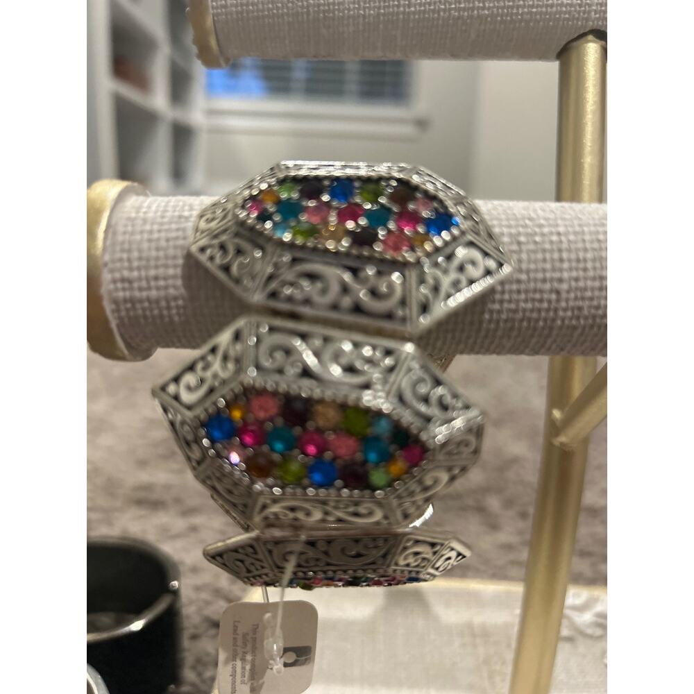 bracelet by the brand cherry. multi color stones